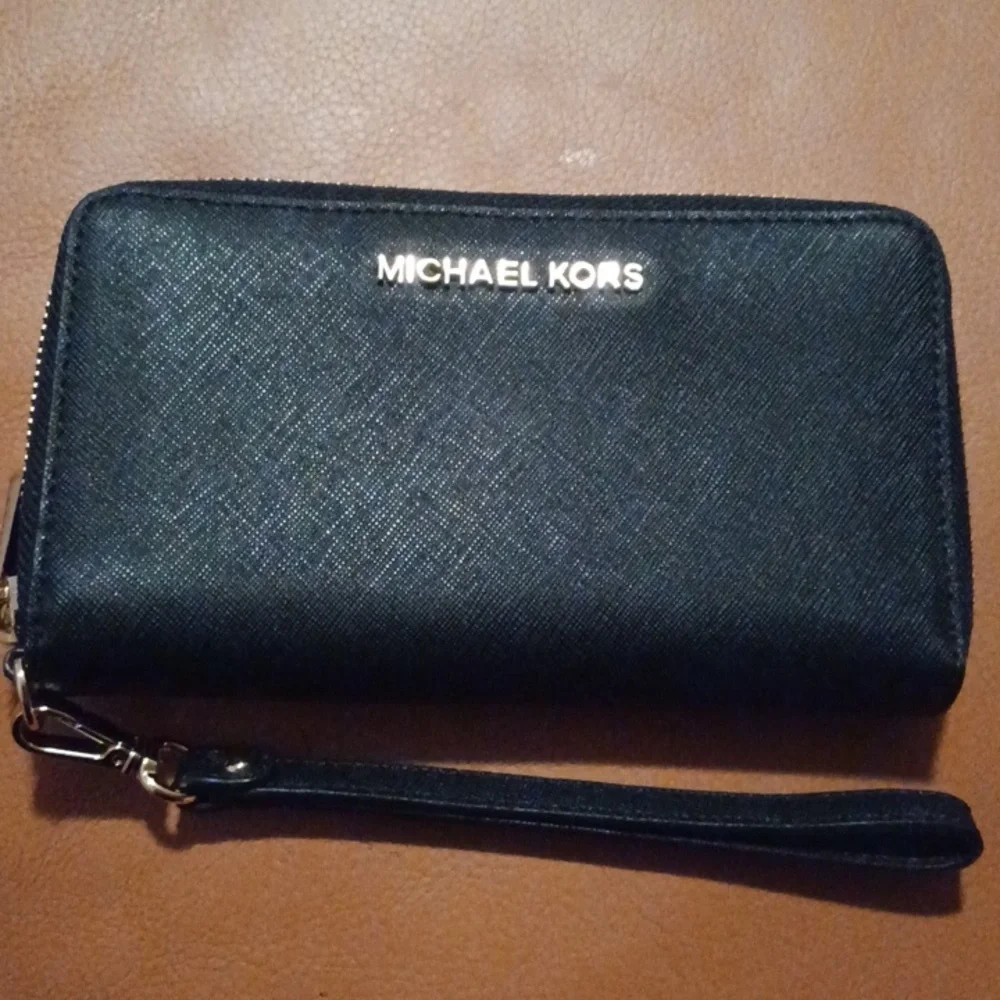 > Michael Kors Black Wristlet with Gold Accents